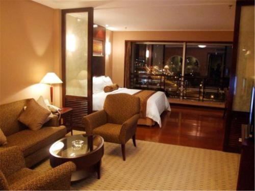 Imagen de la habitación del Hotel Qingdao Blue Horizon - Laoshan. Foto 9