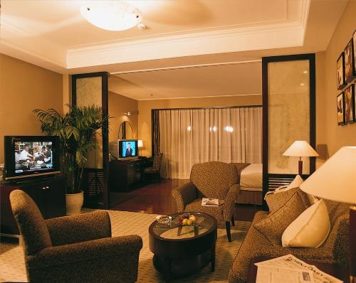 Imagen de la habitación del Hotel Qingdao Blue Horizon - Laoshan. Foto 10