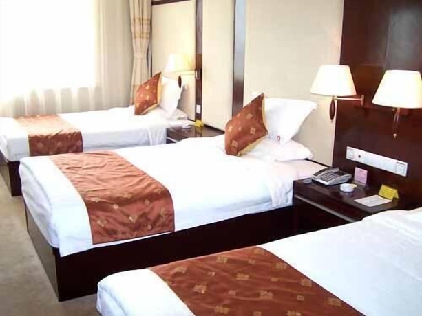 Imagen de la habitación del Hotel Qingdao Chengyang Qiulin. Foto 3