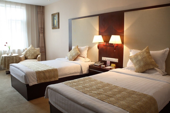 Imagen de la habitación del Hotel Qingdao Chengyang Qiulin. Foto 6