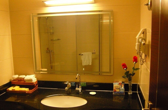 Imagen de la habitación del Hotel Qingdao Chengyang Qiulin. Foto 9
