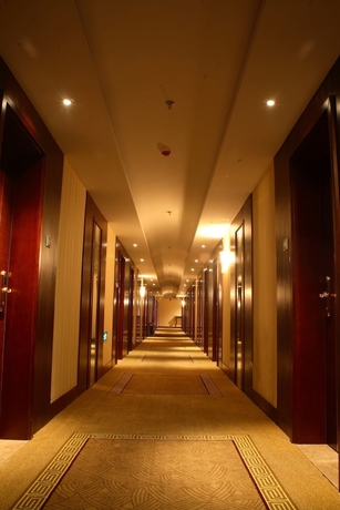 Imagen de los interiores del Hotel Qingdao Chengyang Qiulin. Foto 11