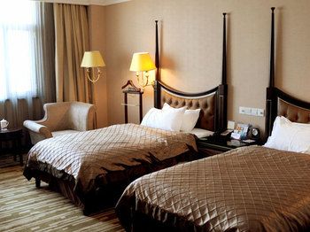 Imagen de la habitación del Hotel Qingdao Danube International. Foto 7