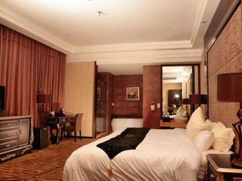 Imagen de la habitación del Hotel Qingdao Danube International. Foto 10