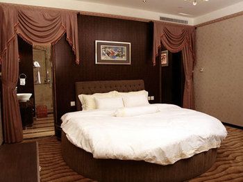 Imagen de la habitación del Hotel Qingdao Danube International. Foto 12