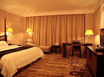 Imagen de la habitación del Hotel Qingdao Danube International. Foto 14