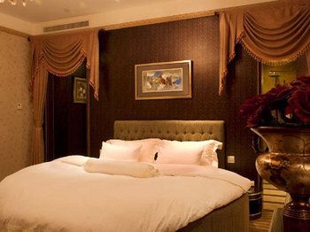 Imagen de la habitación del Hotel Qingdao Danube International. Foto 15