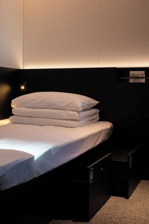 Imagen de la habitación del Hotel Qingdao Desti Youth Park Hostel - Qingdao May Fourth Square. Foto 5