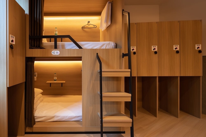 Imagen de la habitación del Hotel Qingdao Desti Youth Park Hostel - Qingdao May Fourth Square. Foto 14