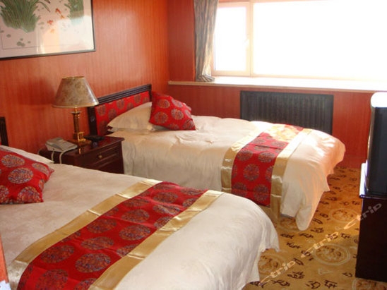 Imagen de la habitación del Hotel Qingdao Donghai. Foto 3