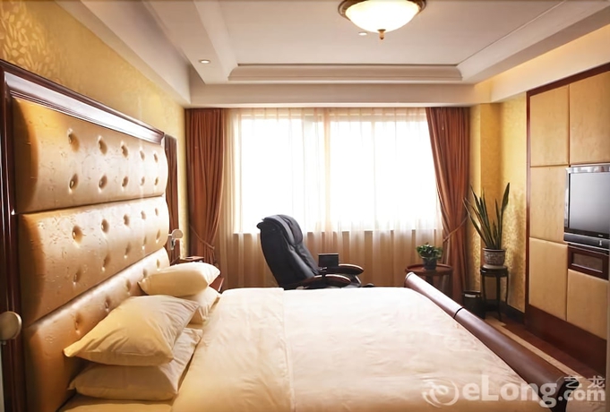 Imagen de la habitación del Hotel Qingdao Fuxin Hotel. Foto 2