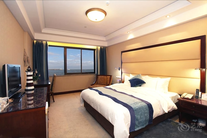 Imagen de la habitación del Hotel Qingdao Fuxin Hotel. Foto 11
