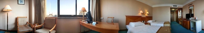 Imagen de la habitación del Hotel Qingdao Fuxin Hotel. Foto 12