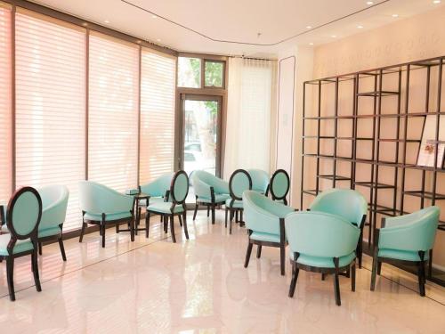 Imagen general del Hotel Qingdao Galaxy Holiday. Foto 3