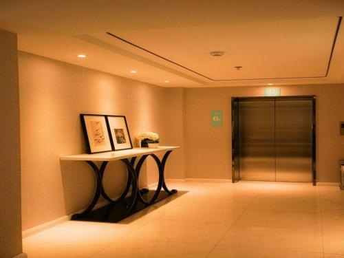Imagen general del Hotel Qingdao Galaxy Holiday. Foto 9