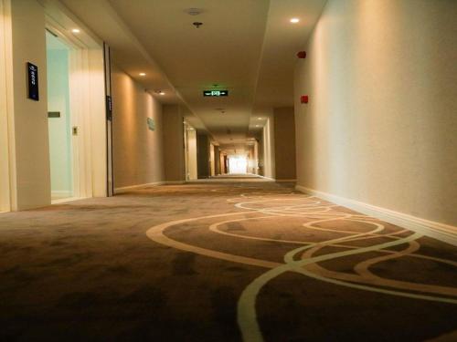 Imagen general del Hotel Qingdao Galaxy Holiday. Foto 10