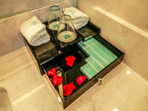 Imagen general del Hotel Qingdao Galaxy Holiday. Foto 15