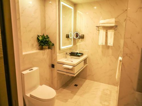Imagen general del Hotel Qingdao Galaxy Holiday. Foto 20