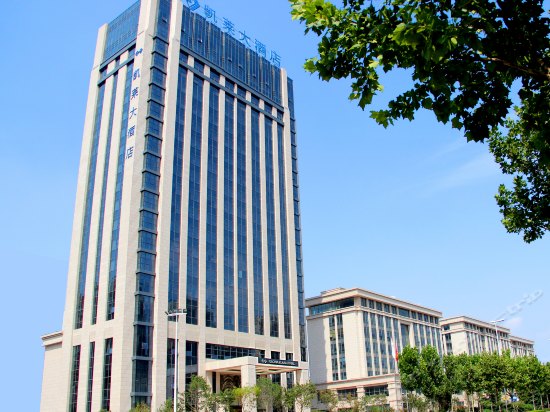 Imagen de los exteriores del Hotel Qingdao Gloria Plaza. Foto 13