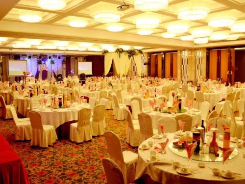 Imagen del bar/restaurante del Hotel Qingdao Haidu, Huangdao. Foto 2