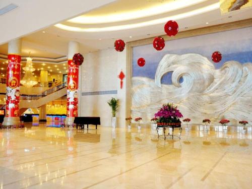 Imagen de los interiores del Hotel Qingdao Haidu, Huangdao. Foto 8