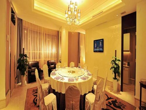 Imagen de los interiores del Hotel Qingdao Haidu, Huangdao. Foto 9