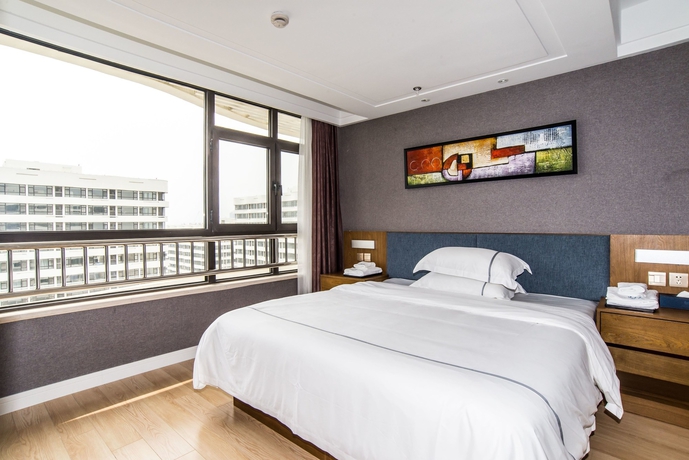 Imagen de la habitación del Hotel Qingdao Haiyue Home Resort. Foto 6