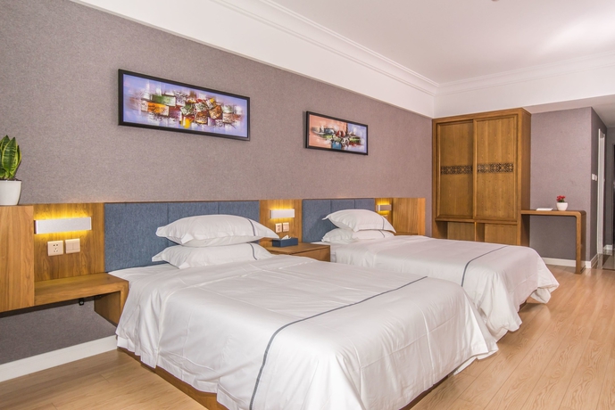 Imagen de la habitación del Hotel Qingdao Haiyue Home Resort. Foto 7