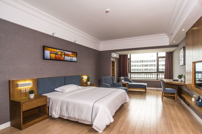 Imagen de la habitación del Hotel Qingdao Haiyue Home Resort. Foto 8