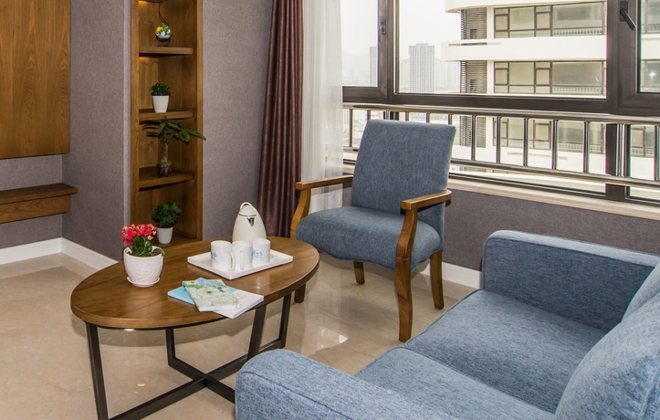 Imagen de la habitación del Hotel Qingdao Haiyue Home Resort. Foto 9
