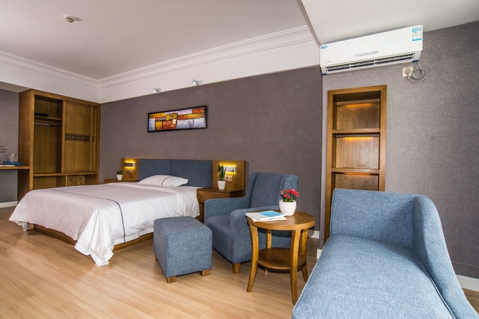 Imagen de la habitación del Hotel Qingdao Haiyue Home Resort. Foto 12
