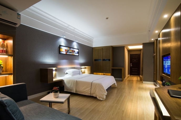 Imagen de la habitación del Hotel Qingdao Haiyue Home Resort. Foto 15