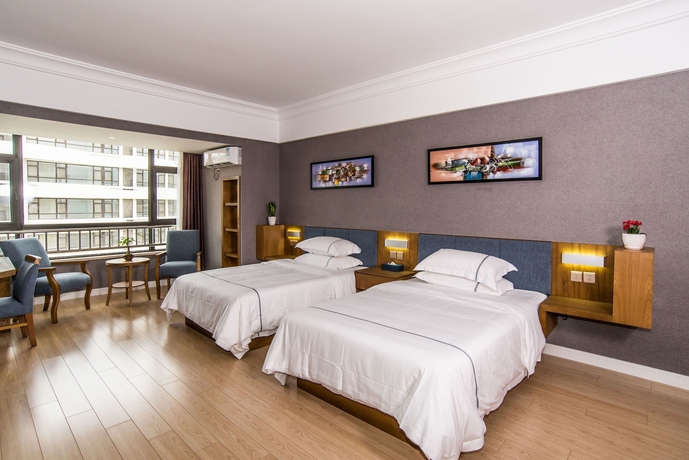 Imagen de la habitación del Hotel Qingdao Haiyue Home Resort. Foto 16