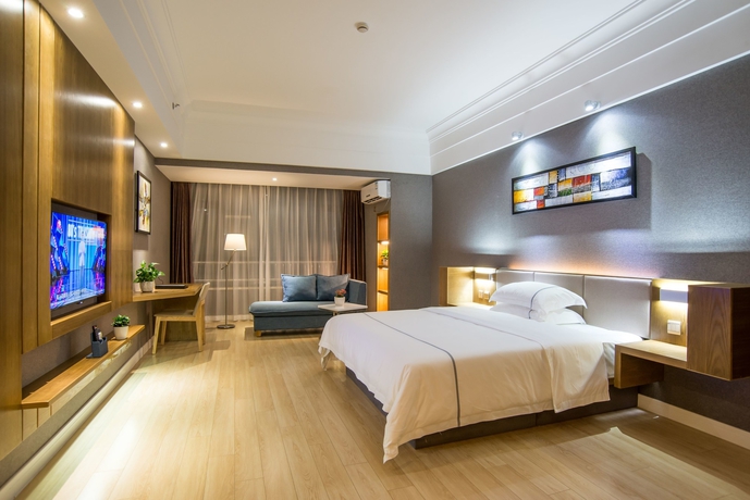 Imagen de la habitación del Hotel Qingdao Haiyue Home Resort. Foto 17