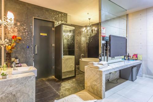 Imagen de la habitación del Hotel Qingdao Heng Bo. Foto 8