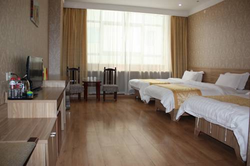 Imagen de la habitación del Hotel Qingdao Hongyun Jiahe Business. Foto 1