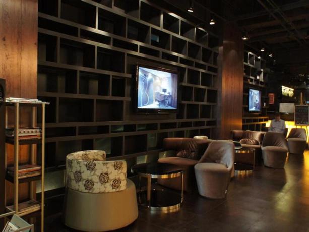 Imagen general del Hotel Qingdao Housing International. Foto 5