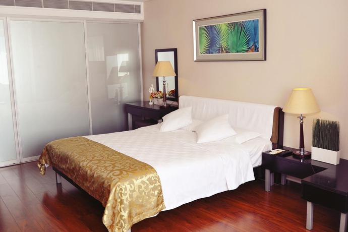 Imagen general del Hotel Qingdao Housing International. Foto 6