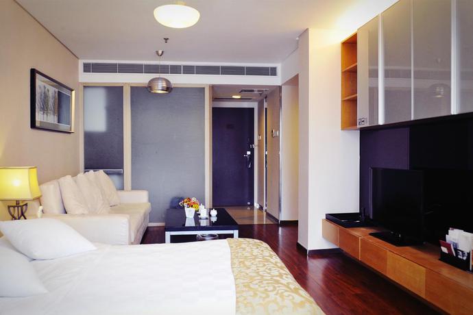 Imagen general del Hotel Qingdao Housing International. Foto 7