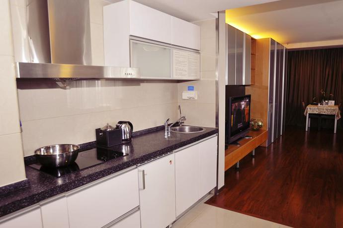 Imagen general del Hotel Qingdao Housing International. Foto 8