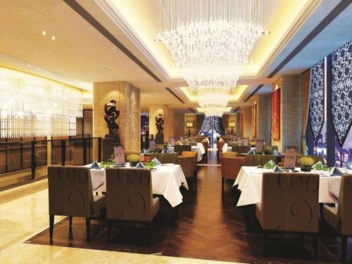 Imagen general del Hotel Qingdao Huaxi Laixi. Foto 3