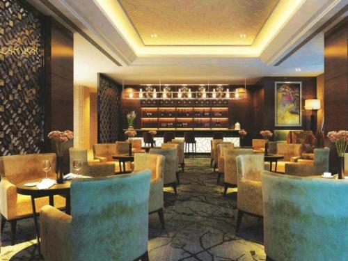 Imagen general del Hotel Qingdao Huaxi Laixi. Foto 6