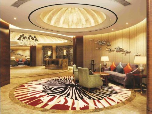 Imagen general del Hotel Qingdao Huaxi Laixi. Foto 11