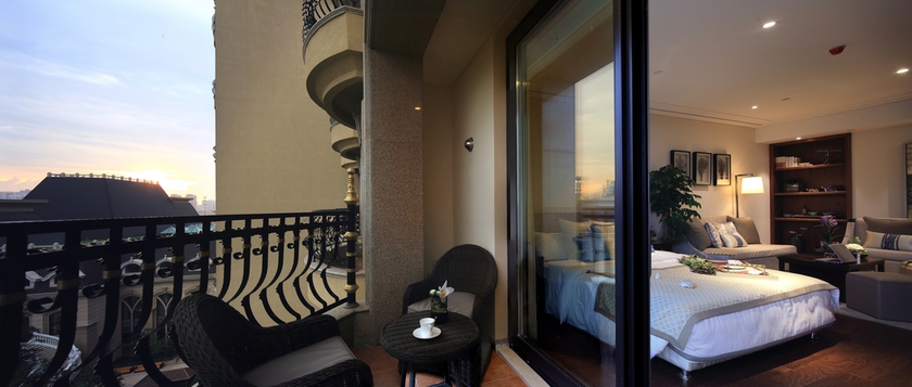 Imagen de la habitación del Hotel Qingdao Impression Hotel. Foto 4