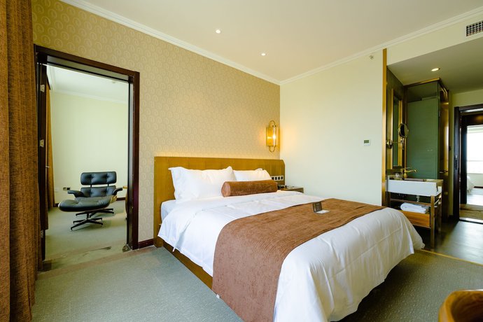 Imagen de la habitación del Hotel Qingdao James Joyce. Foto 5