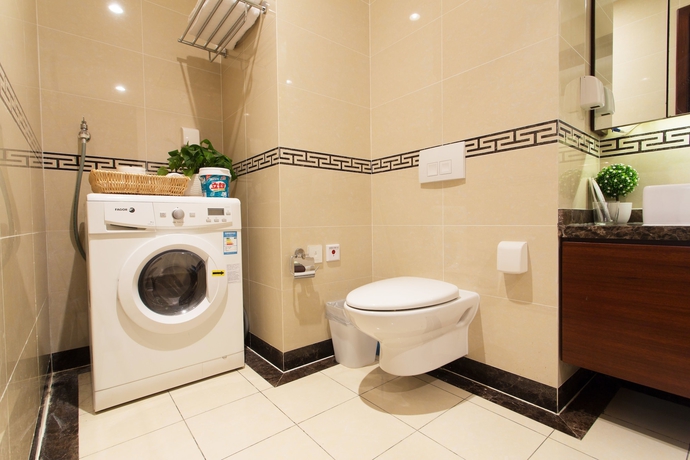 Imagen de la habitación del Hotel Qingdao Jinshan We Holiday Apt Wusi. Foto 2