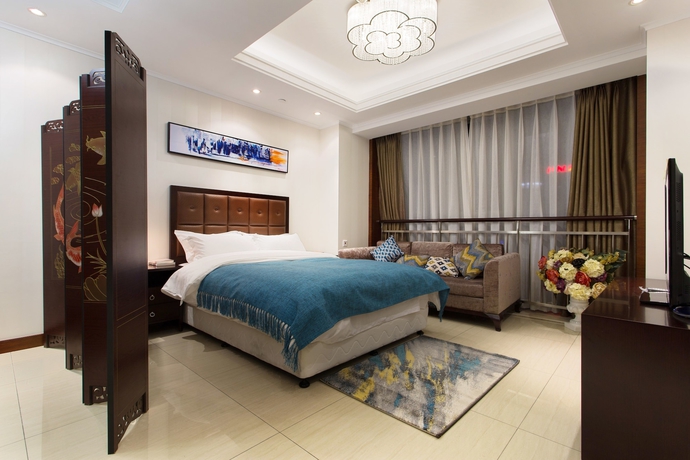 Imagen de la habitación del Hotel Qingdao Jinshan We Holiday Apt Wusi. Foto 5