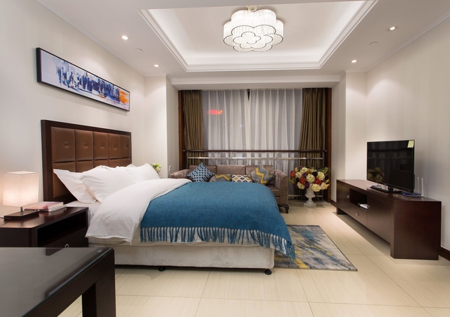 Imagen de la habitación del Hotel Qingdao Jinshan We Holiday Apt Wusi. Foto 7