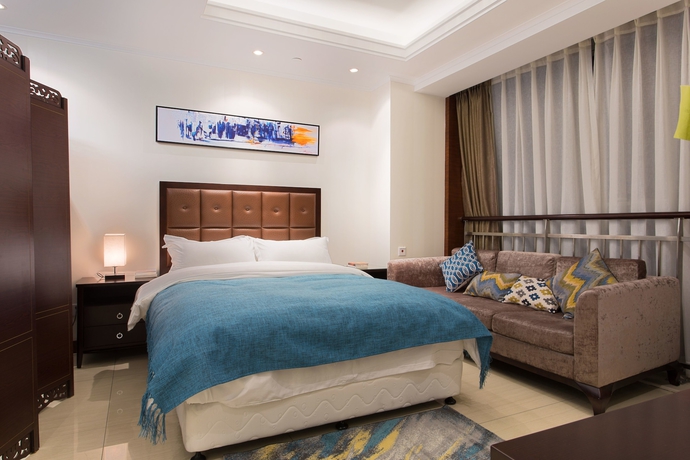 Imagen de la habitación del Hotel Qingdao Jinshan We Holiday Apt Wusi. Foto 8