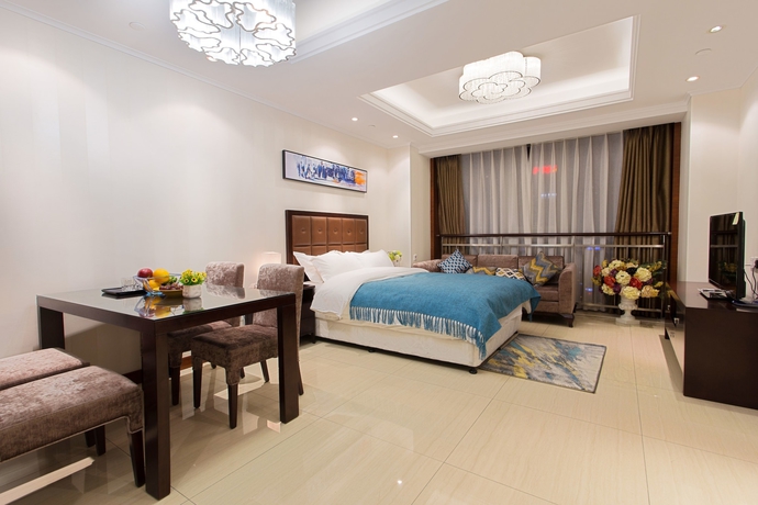 Imagen de la habitación del Hotel Qingdao Jinshan We Holiday Apt Wusi. Foto 9